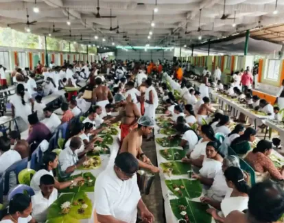 swami gururetnam providing annadanam